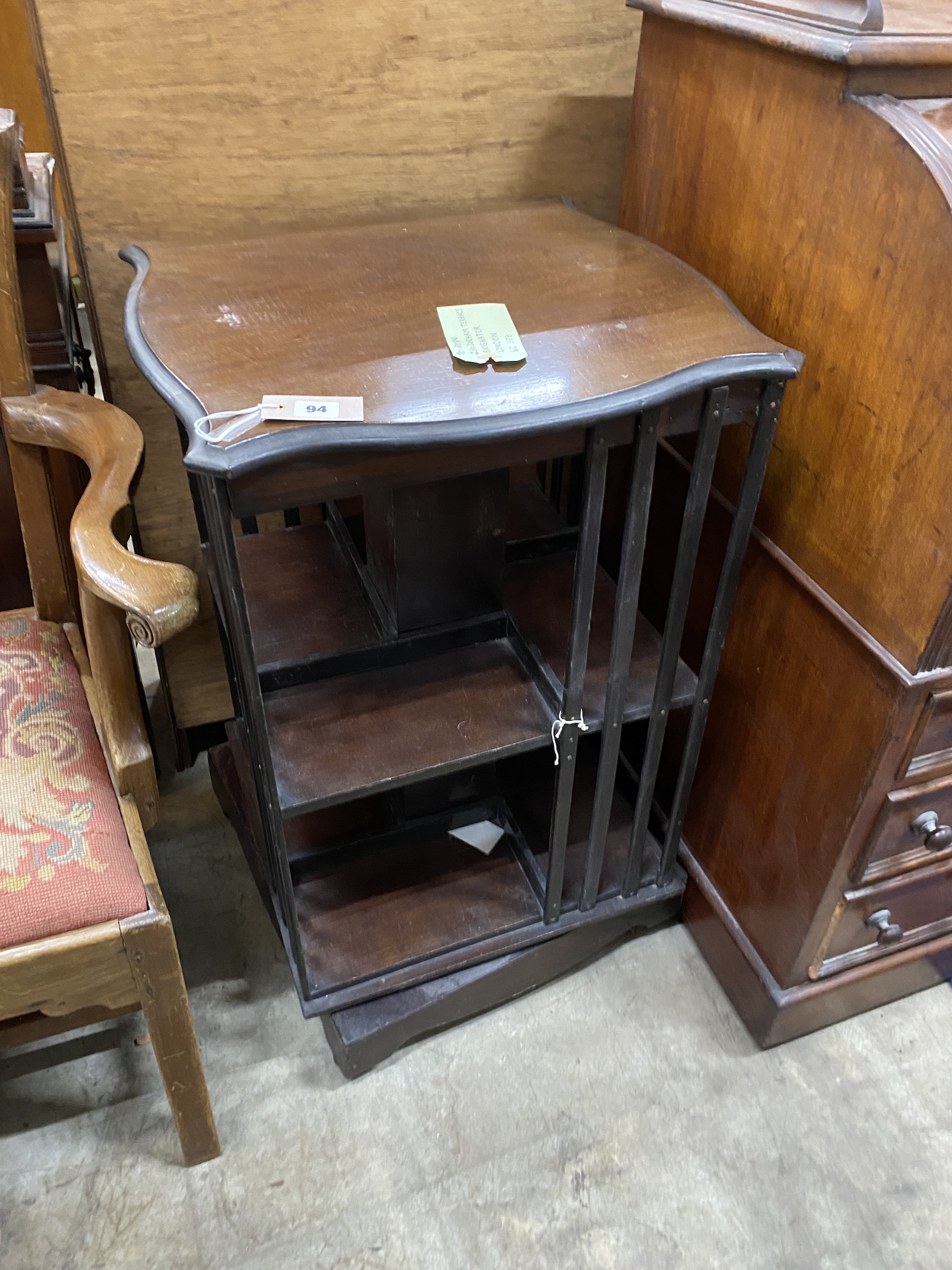 An Edwardian mahogany revolving bookcase, width 50cm, depth 50cm, height 83cm